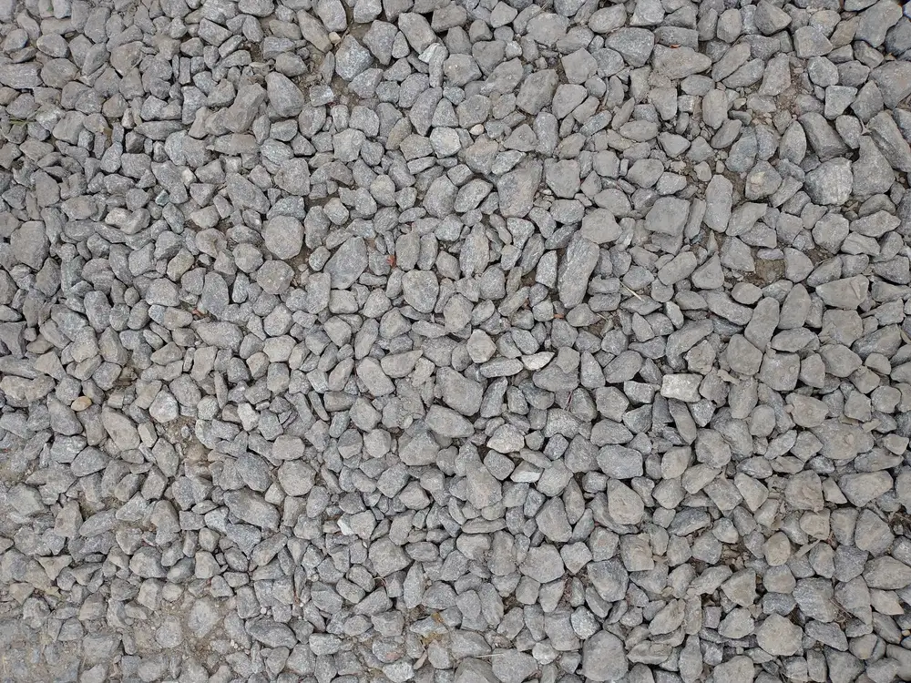 Close-up of graded grey gravel used as a sub-base